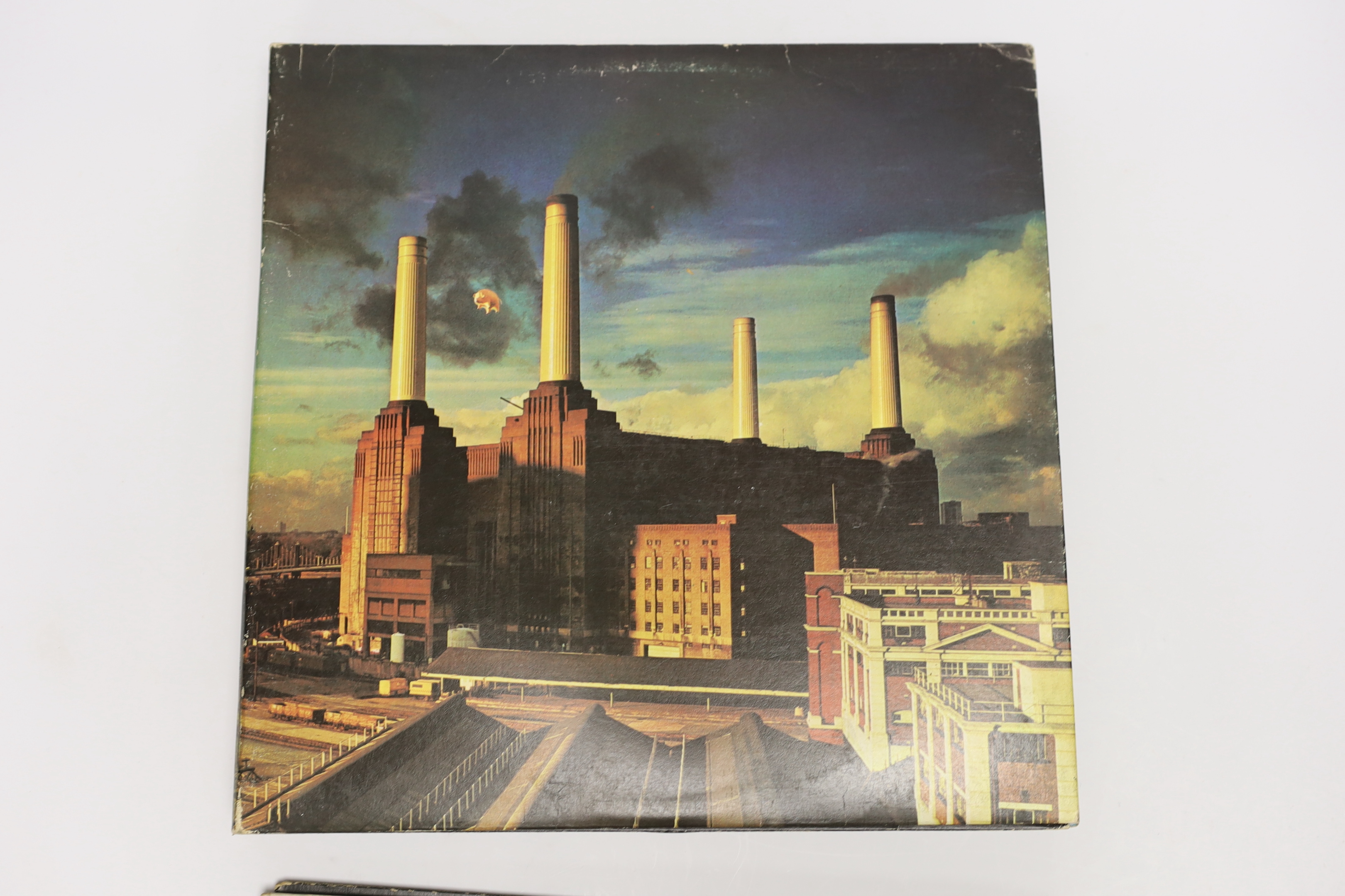 Eleven record record albums by Pink Floyd and the Beatles (and related), including; Revolver, Rubber Soul, Beatles For Sale, Atom Heart Mother, Dark Side of the Moon, Animals, Meddle, etc.